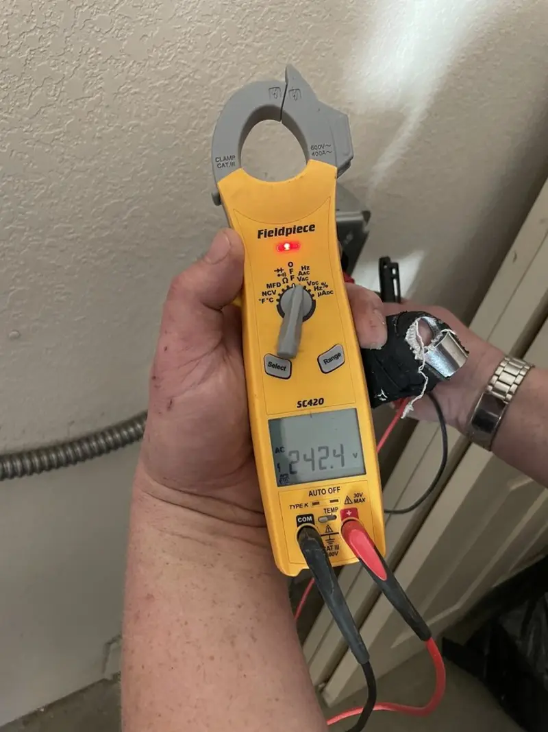 Voltage testing with clamp meter during Hot Tub / Pool Electrical Wiring in Loveland
